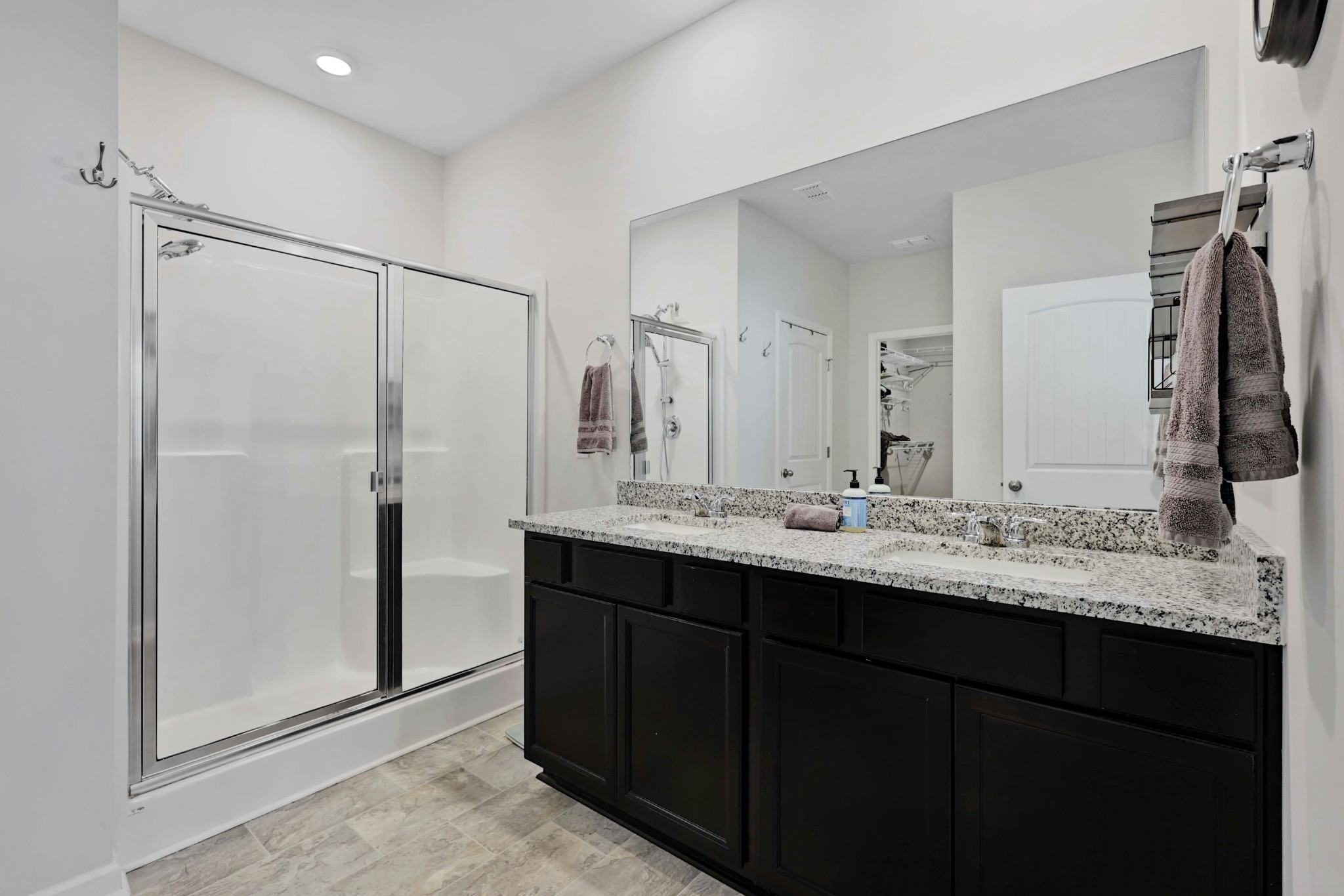 7764 Stapleton Chase Drive Antioch, TN 37013 - Photo 16 of 31 a bathroom with a double vanity sink mirror and double