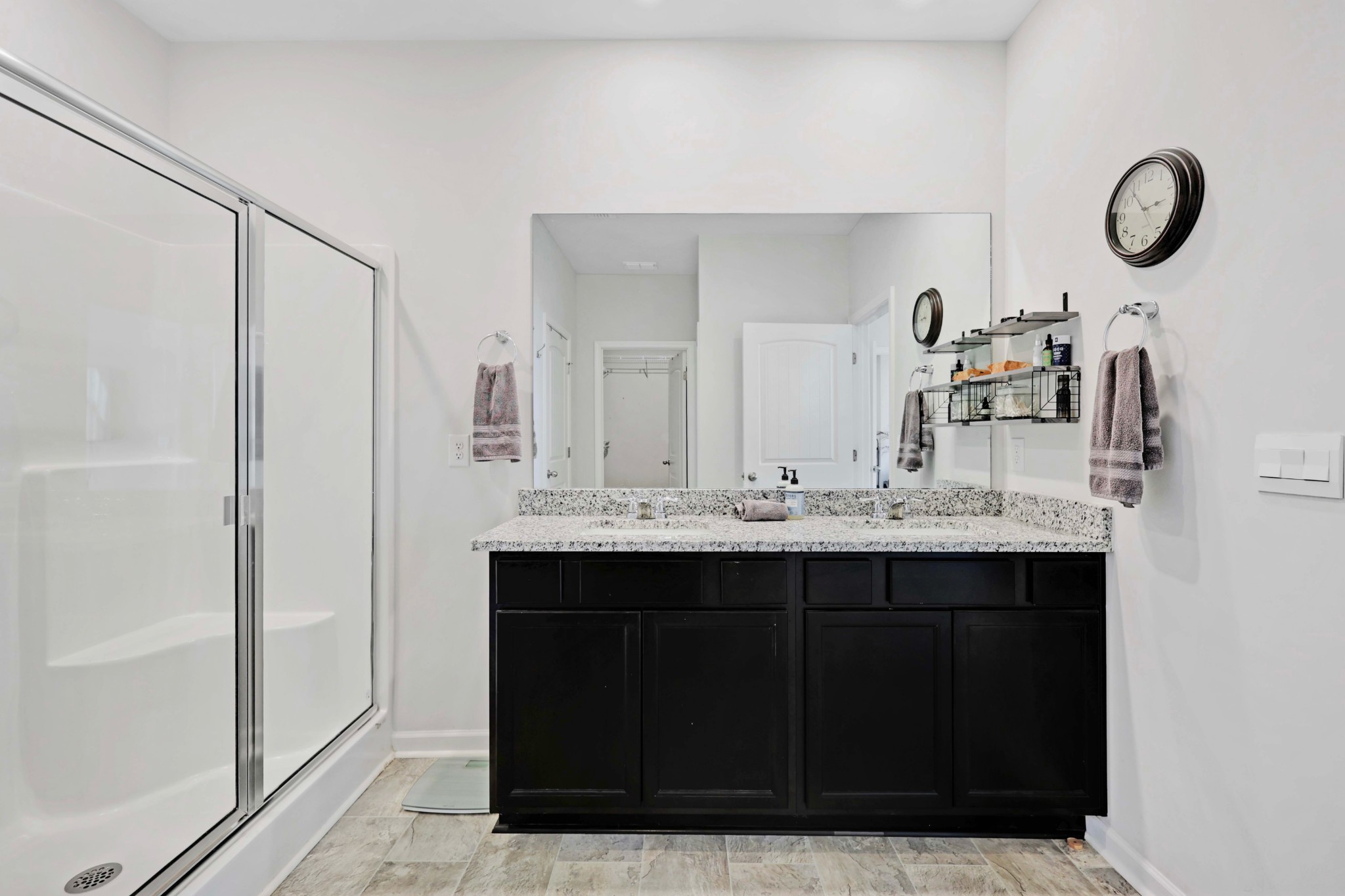 7764 Stapleton Chase Drive Antioch, TN 37013 - Photo 17 of 31 a bathroom with a sink and a mirror