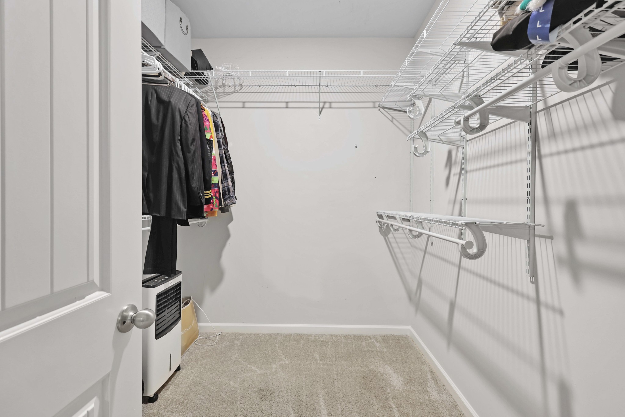 7764 Stapleton Chase Drive Antioch, TN 37013 - Photo 18 of 31 a view of walk in closet with clothes