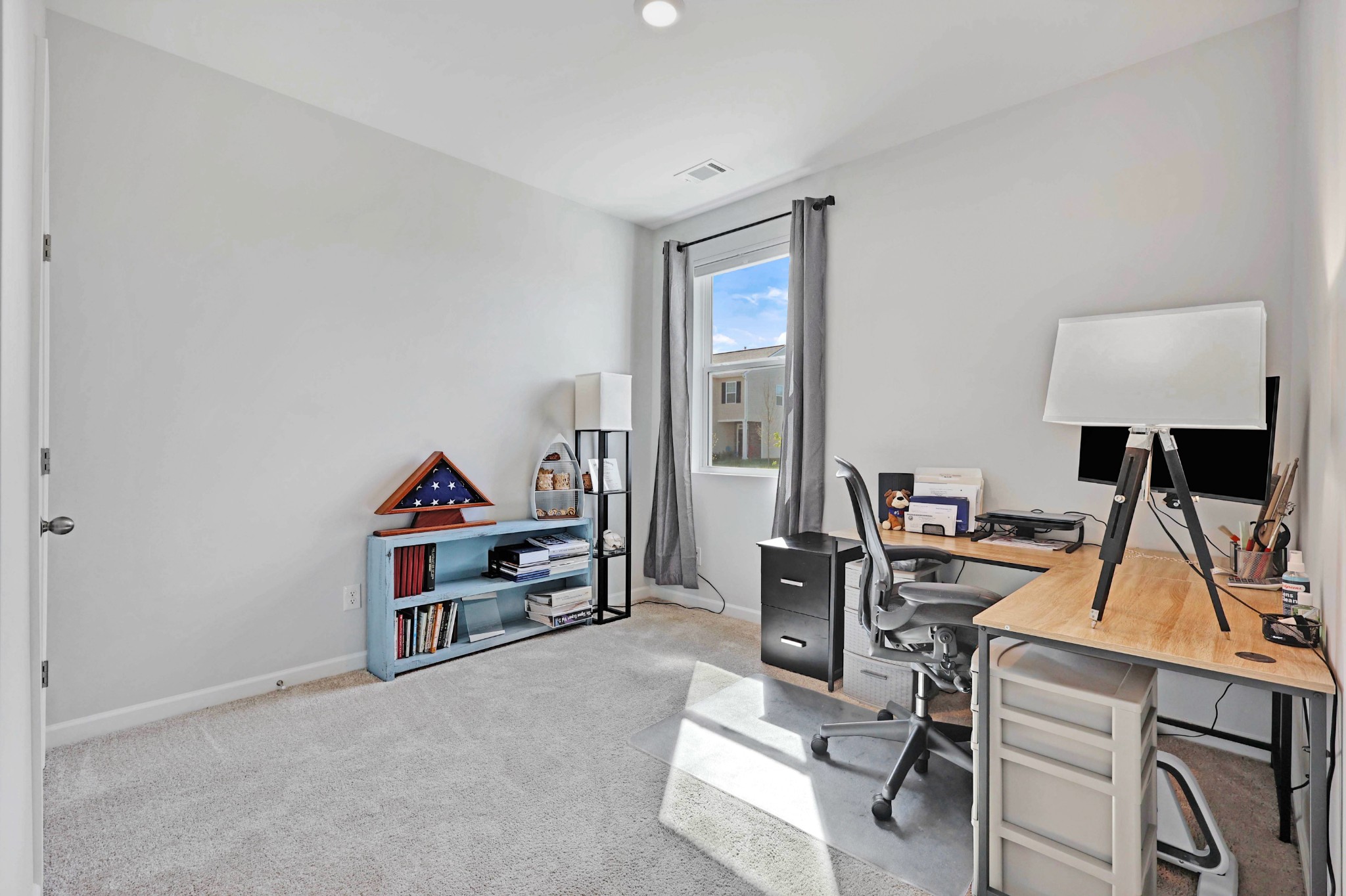 7764 Stapleton Chase Drive Antioch, TN 37013 - Photo 21 of 31 a view of a workspace with furniture and a window