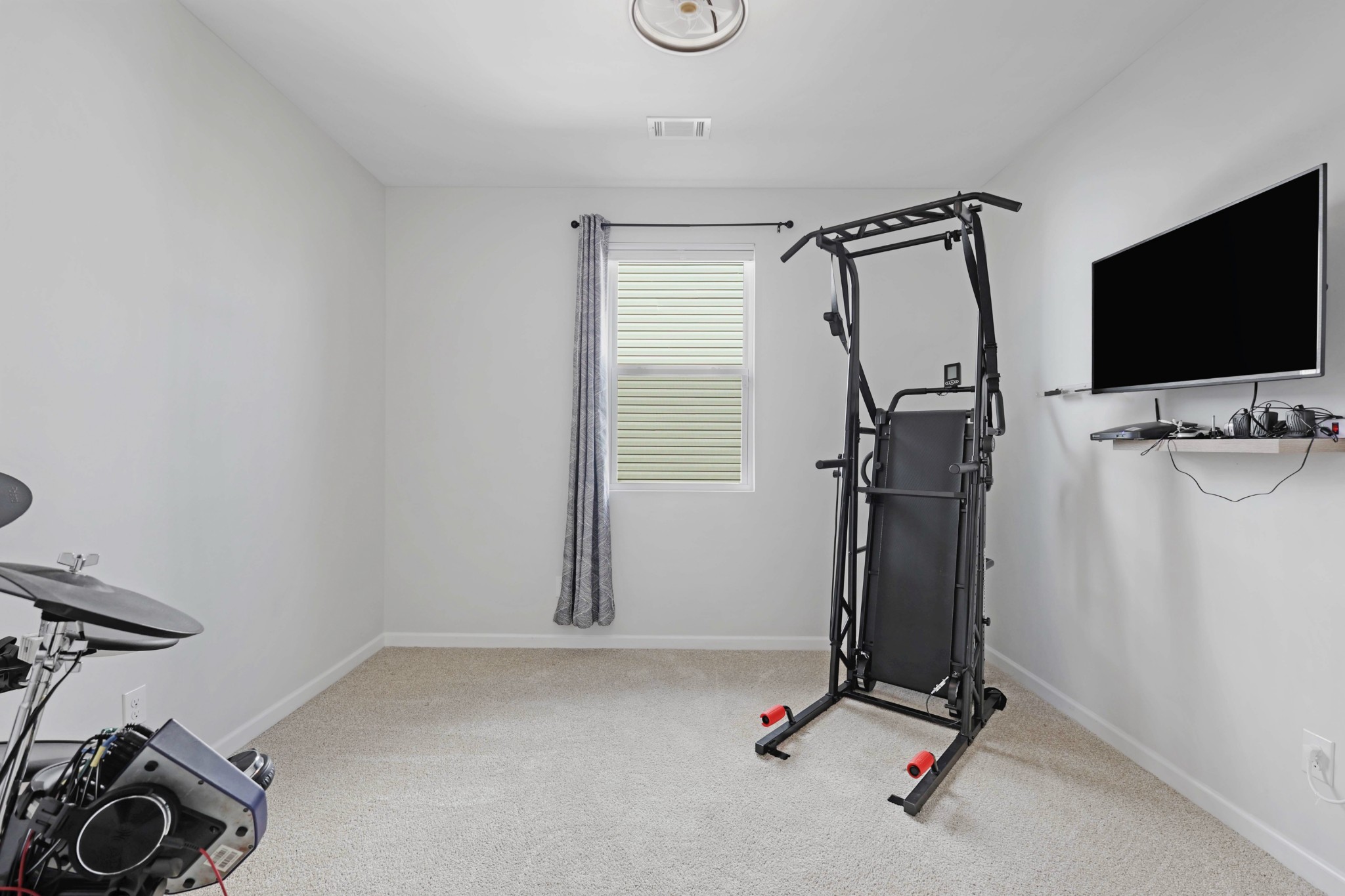 7764 Stapleton Chase Drive Antioch, TN 37013 - Photo 23 of 31 a view of a room with gym equipment