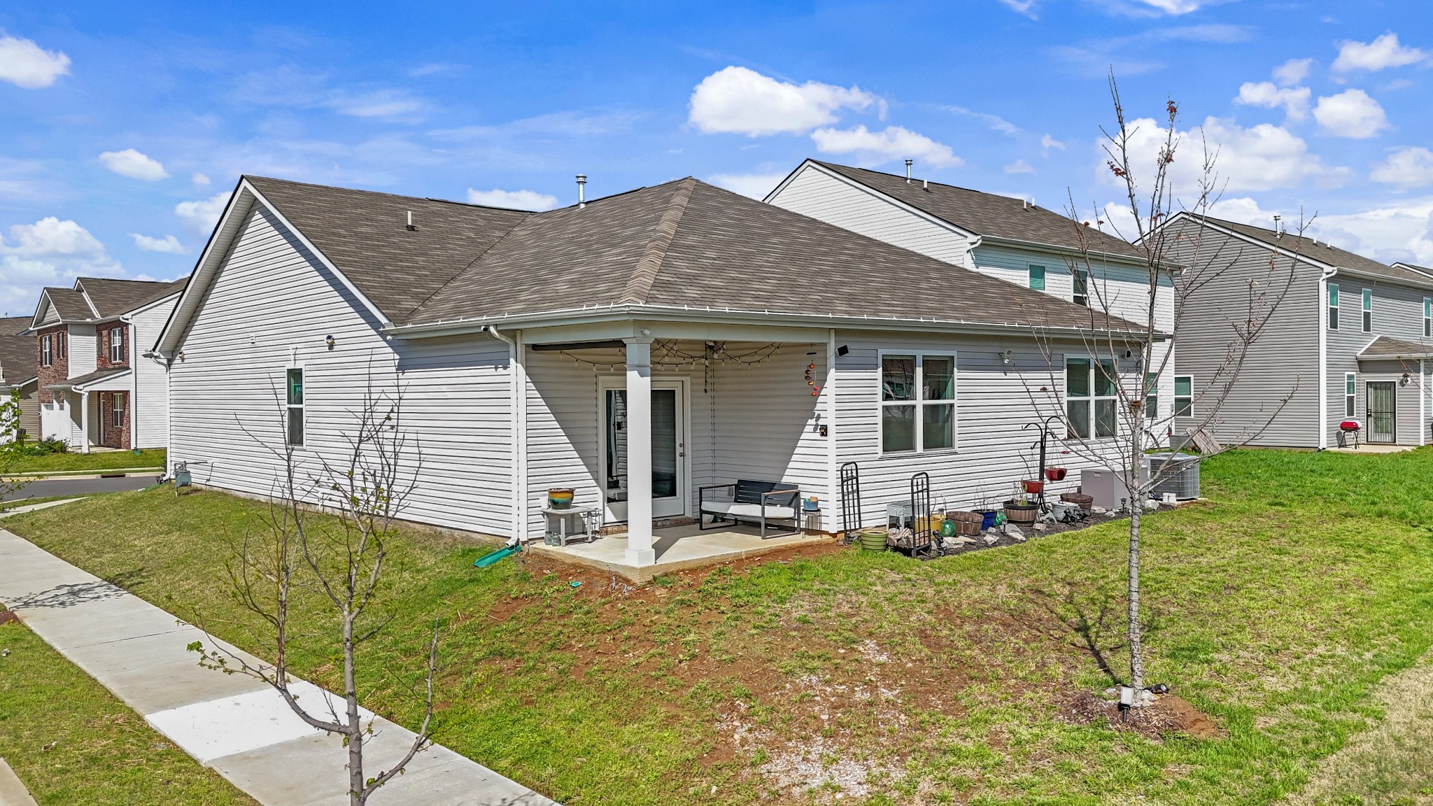 7764 Stapleton Chase Drive Antioch, TN 37013 - Photo 30 of 31 a front view of a house with garden