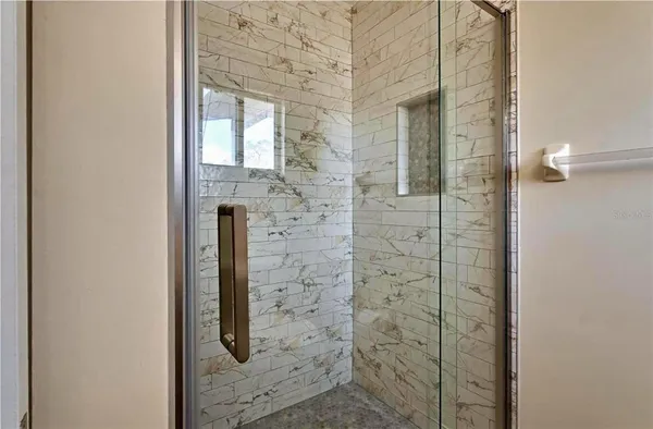 an aerial view of a house with a garden