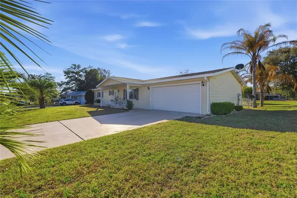 a house view with a garden space