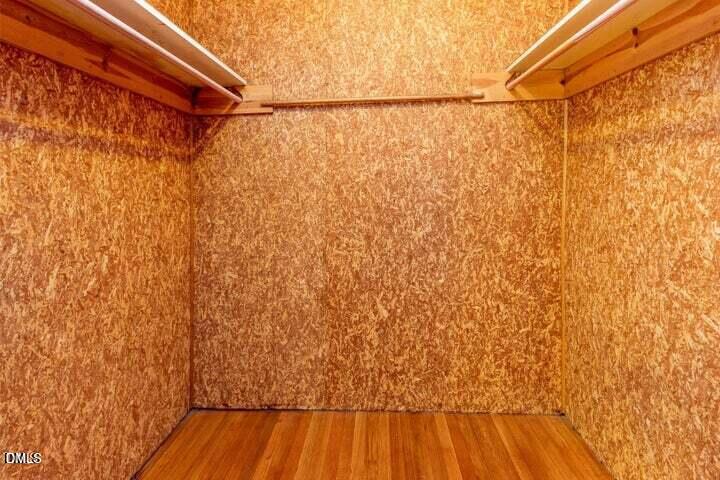 3209 Marie Drive Raleigh, NC 27604 - Photo 24 of 40 a view of a room with wooden floor and bench