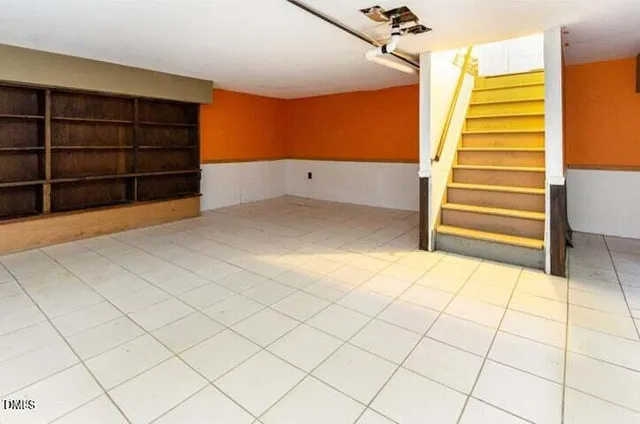 a view of closet area with empty racks