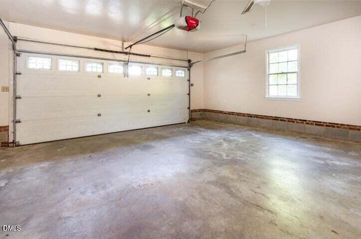3209 Marie Drive Raleigh, NC 27604 - Photo 32 of 40 an empty room with windows