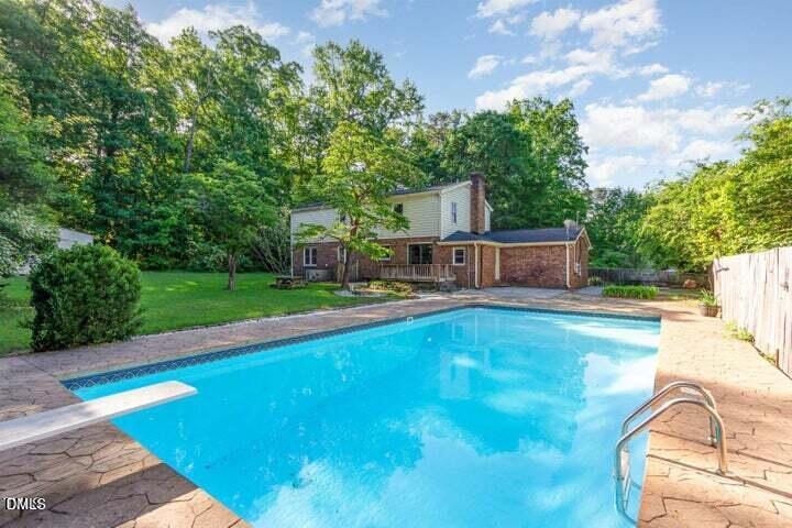 3209 Marie Drive Raleigh, NC 27604 - Photo 39 of 40 a view of a swimming pool with a patio