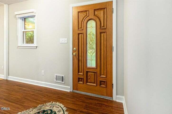 3209 Marie Drive Raleigh, NC 27604 - Photo 6 of 40 a view of front door with wooden floor