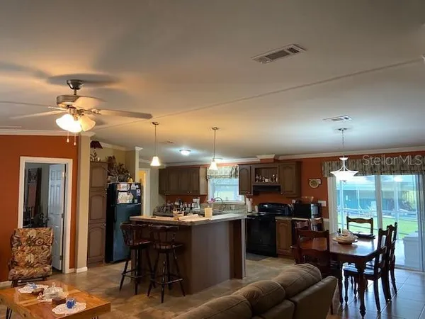 a view of a dining room with furniture