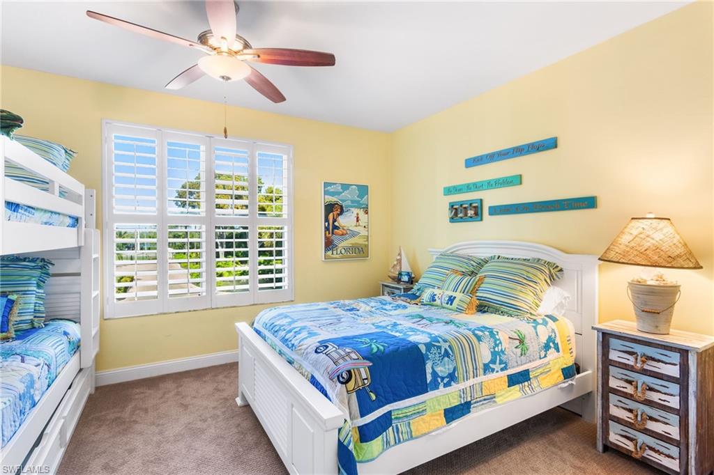 4975 Bonita Beach Road Southwest Bonita Springs, FL 34134 - Photo 24 of 49 Large guest room with full size bed + twin bunk beds and Plantation shutters!