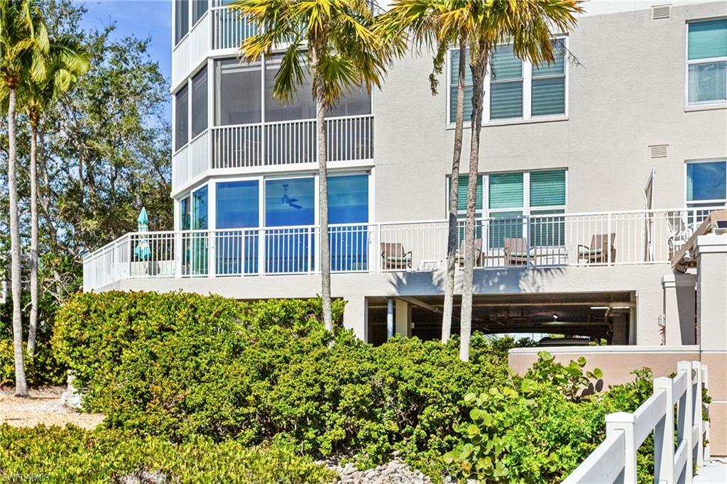 4975 Bonita Beach Road Southwest Bonita Springs, FL 34134 - Photo 34 of 49 Back of unit 107-end unit with wrap around lanai!