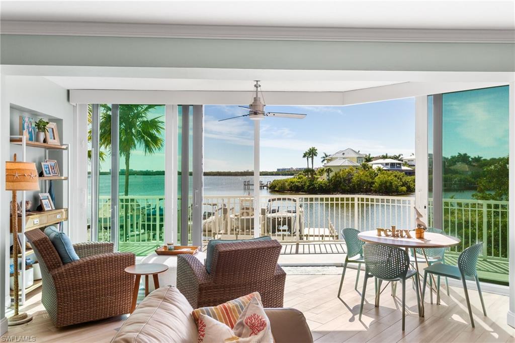 4975 Bonita Beach Road Southwest Bonita Springs, FL 34134 - Photo 4 of 49 Great Room was extended-sliders lead you to the open balcony