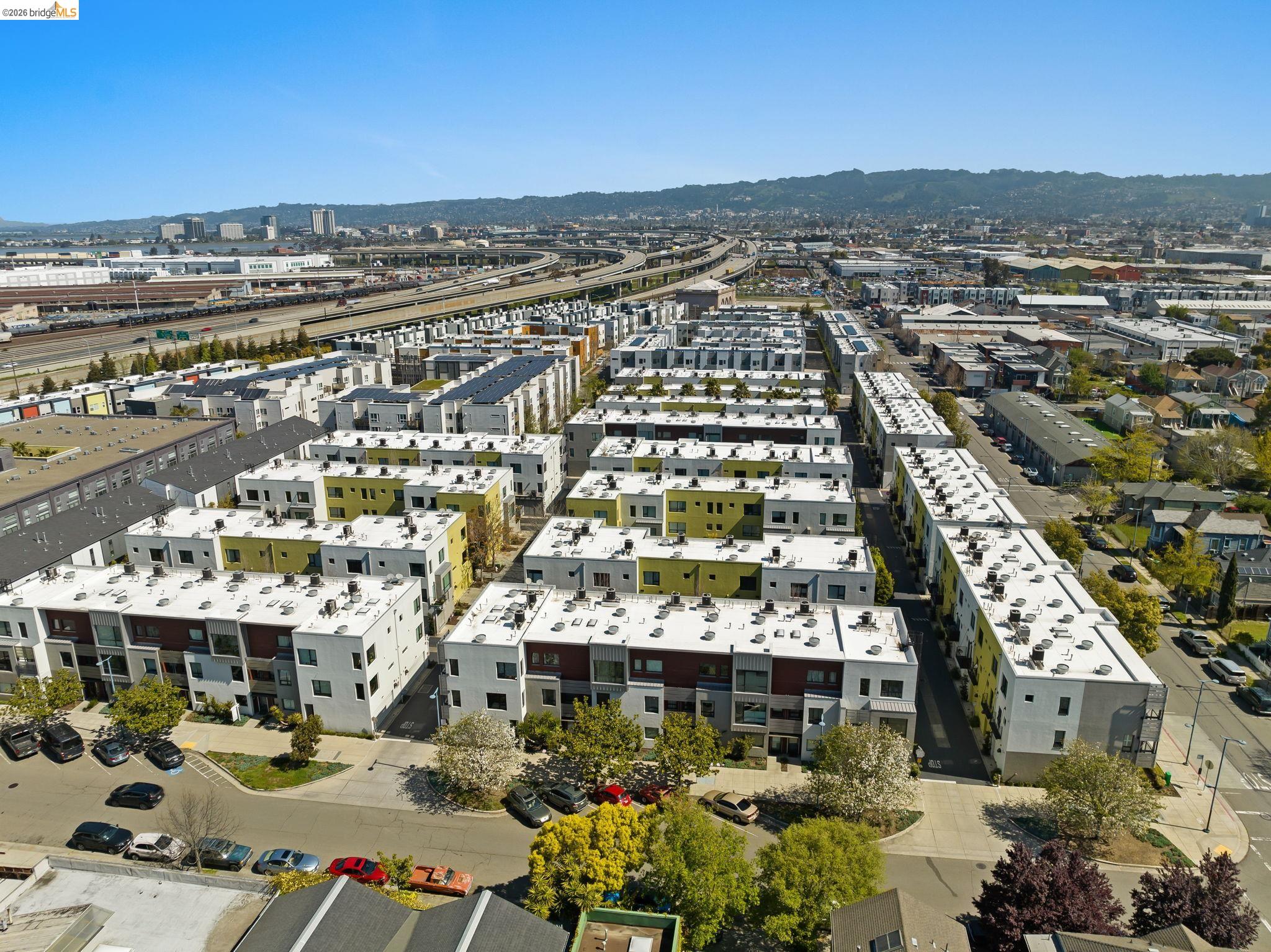 1780 12th Street Oakland, CA 94607 - Photo 30 of 31 an aerial view of a building with parking