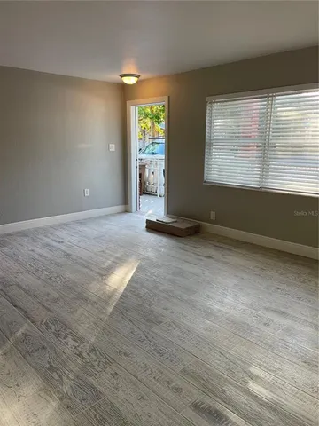 a kitchen with stainless steel appliances granite countertop a refrigerator sink and cabinets