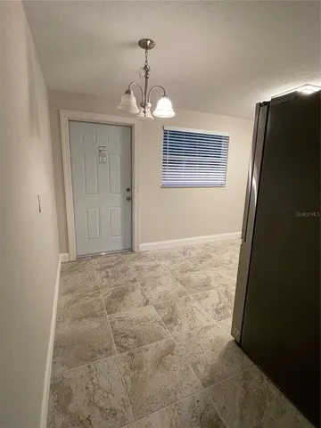 a bathroom with a shower toilet and sink