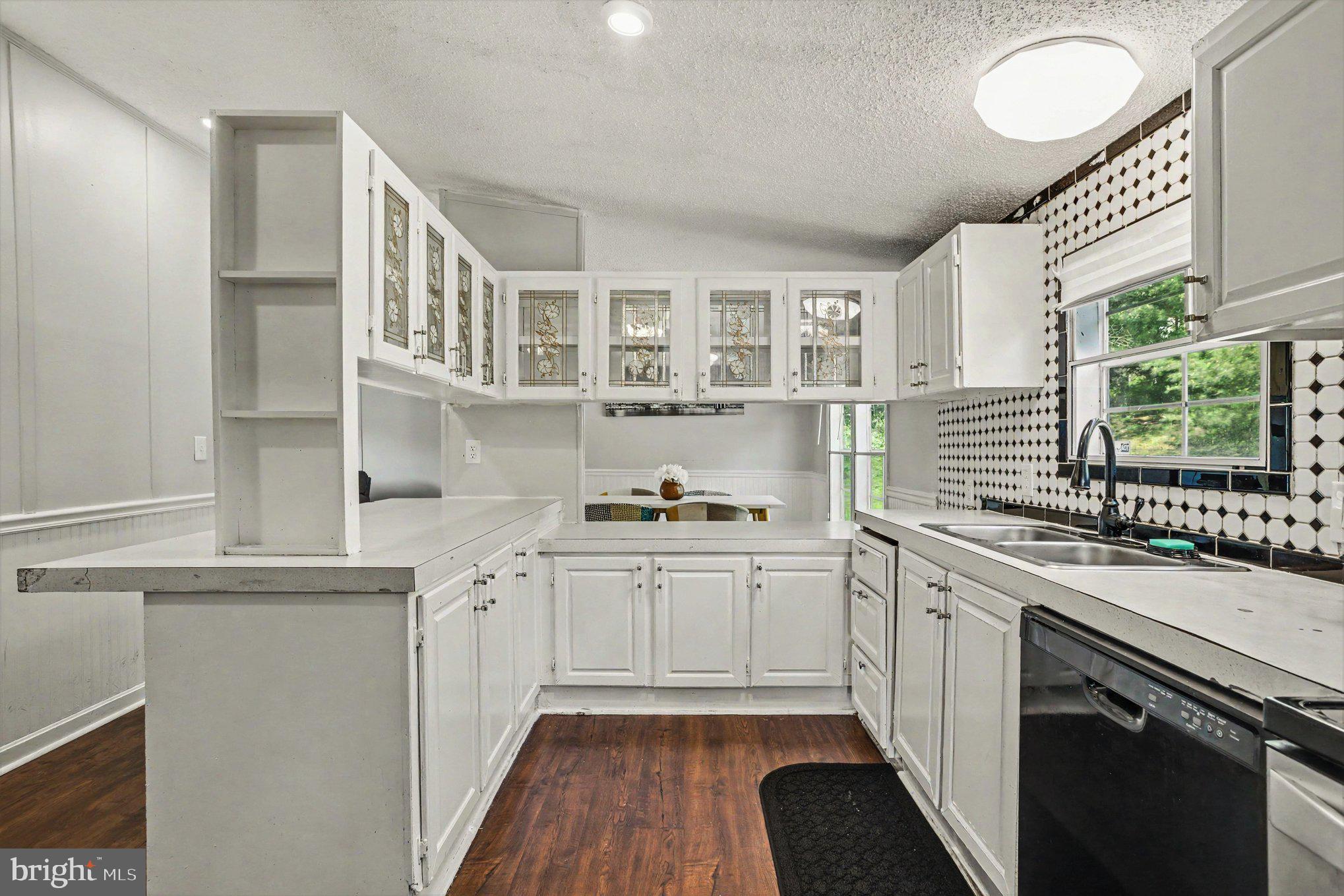 2002 David Drive Edgewood, MD 21040 - Photo 12 of 26 a kitchen with stainless steel appliances granite countertop a stove and a sink