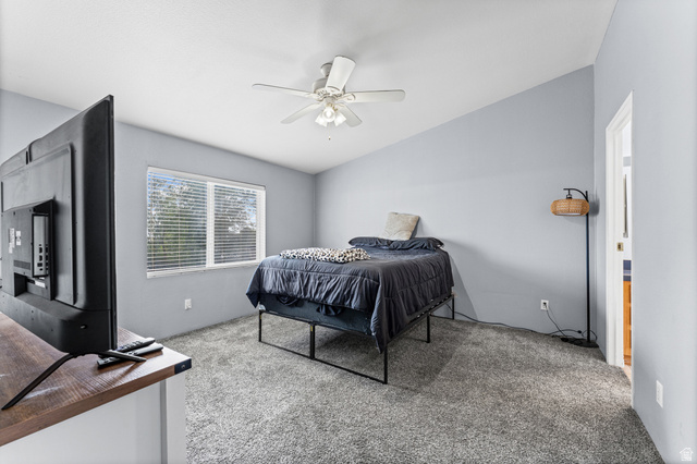 312 Harriger Way Layton, UT 84041 - Photo 23 of 36 Vaulted ceiling, ceiling fan, window with blinds, light gray carpet, and wood-finish countertop