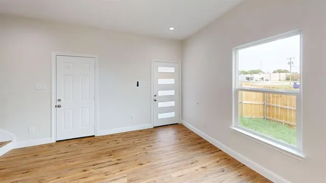 a view of an empty room and window