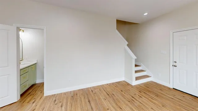 a view of entryway with wooden floor