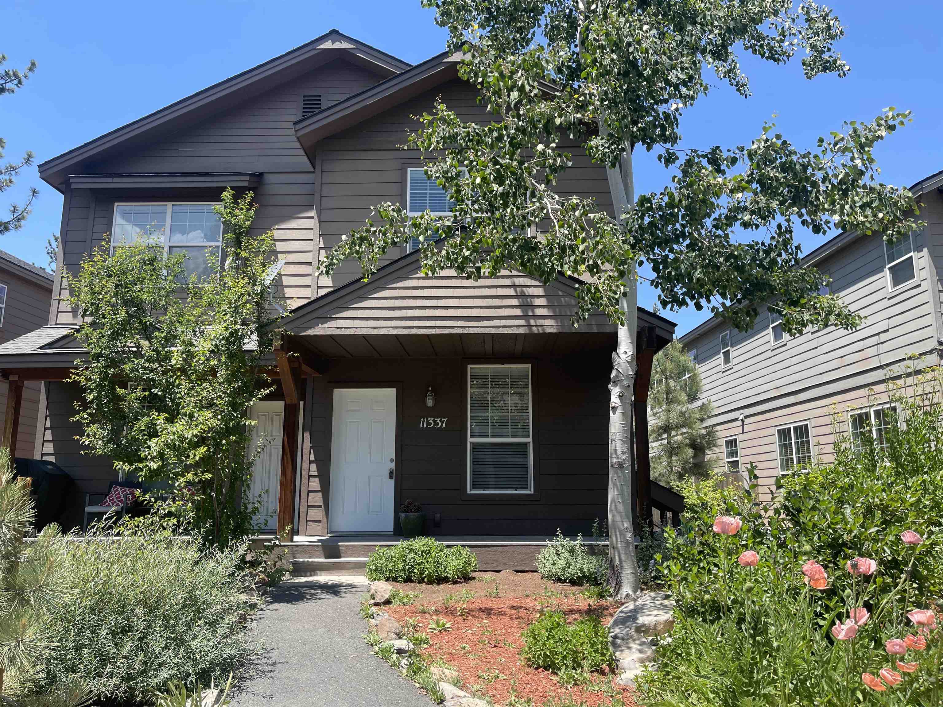 11337 Wolverine Circle Truckee, CA 96161 - Photo 1 of 1 a front view of a house with a yard