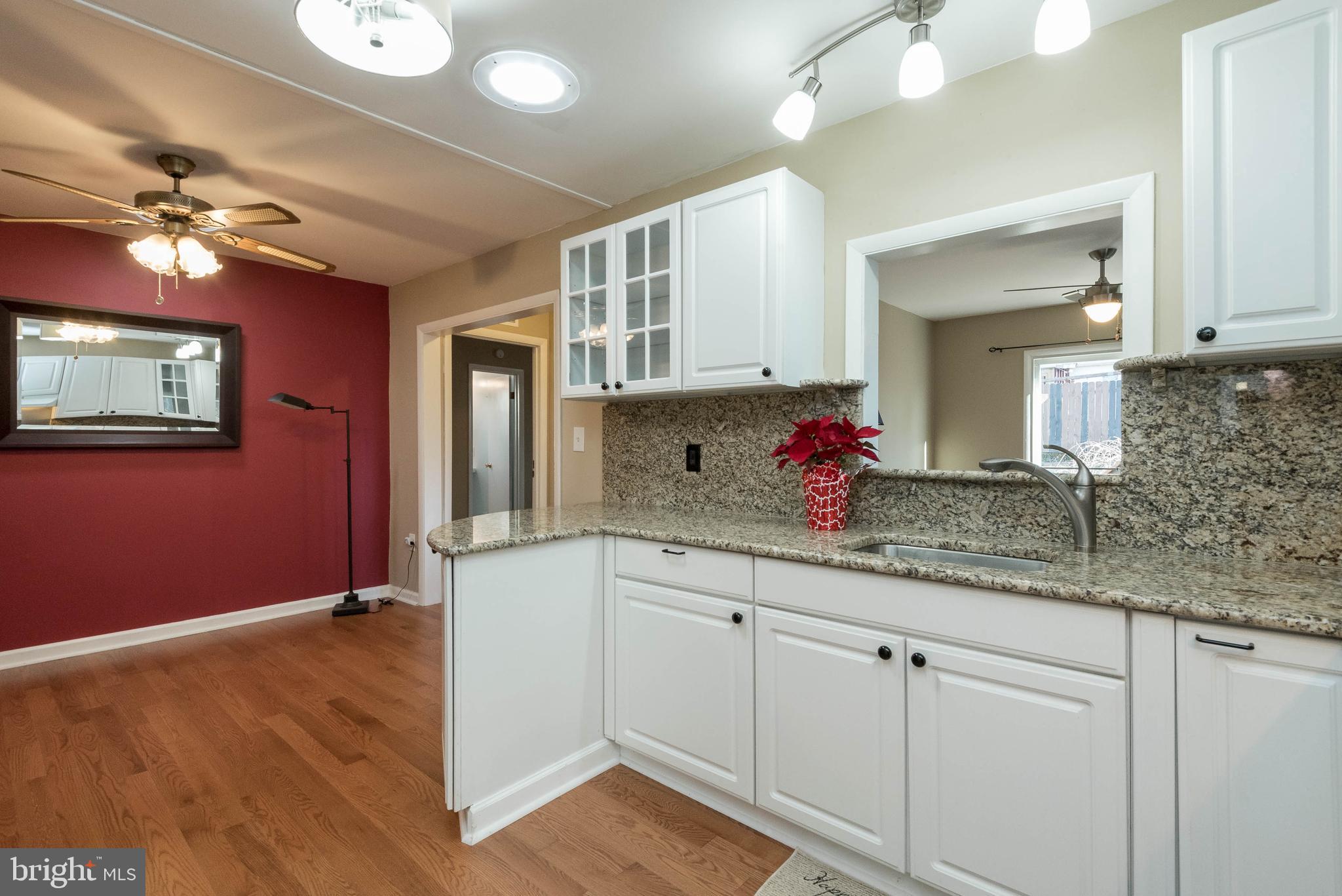 319 Brock Bridge Road Laurel, MD 20724 - Photo 6 of 38 Renovated Kitchen with View of Dining Area