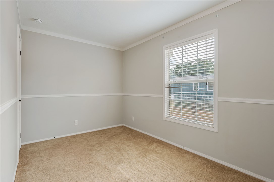 9144 Hensarling Lane Bryan, TX 77808 - Photo 10 of 25 a view of an empty room with a window