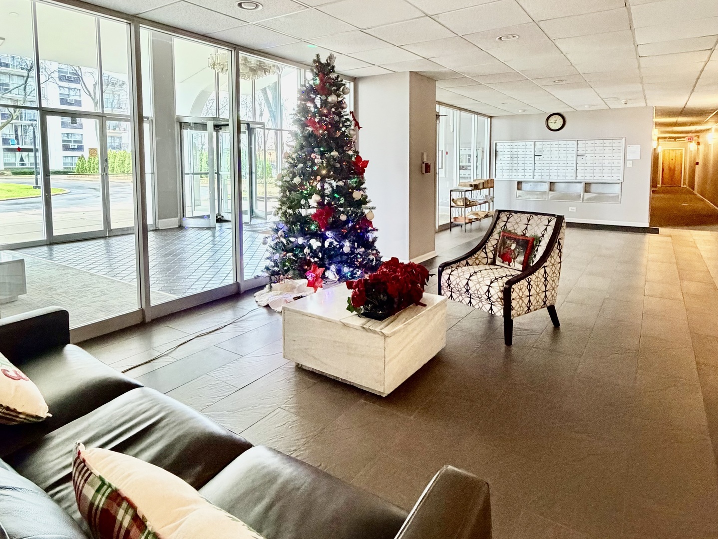 9009 Golf Road, Unit 2A Des Plaines, IL 60016 - Photo 16 of 18 a living room with furniture and a large window