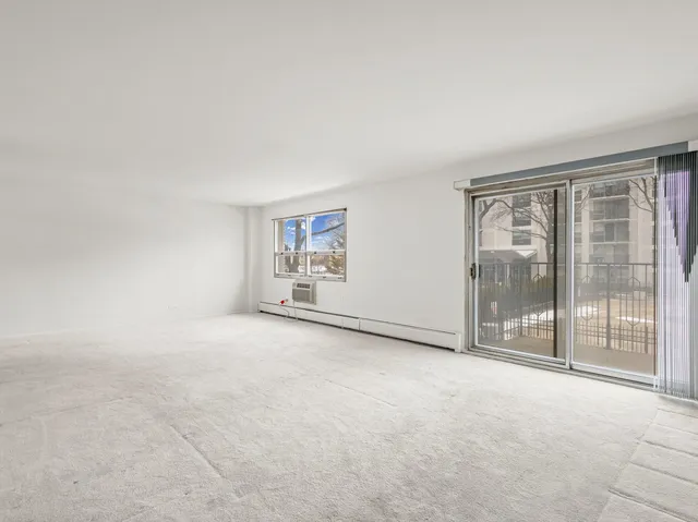 an empty room with entrance door