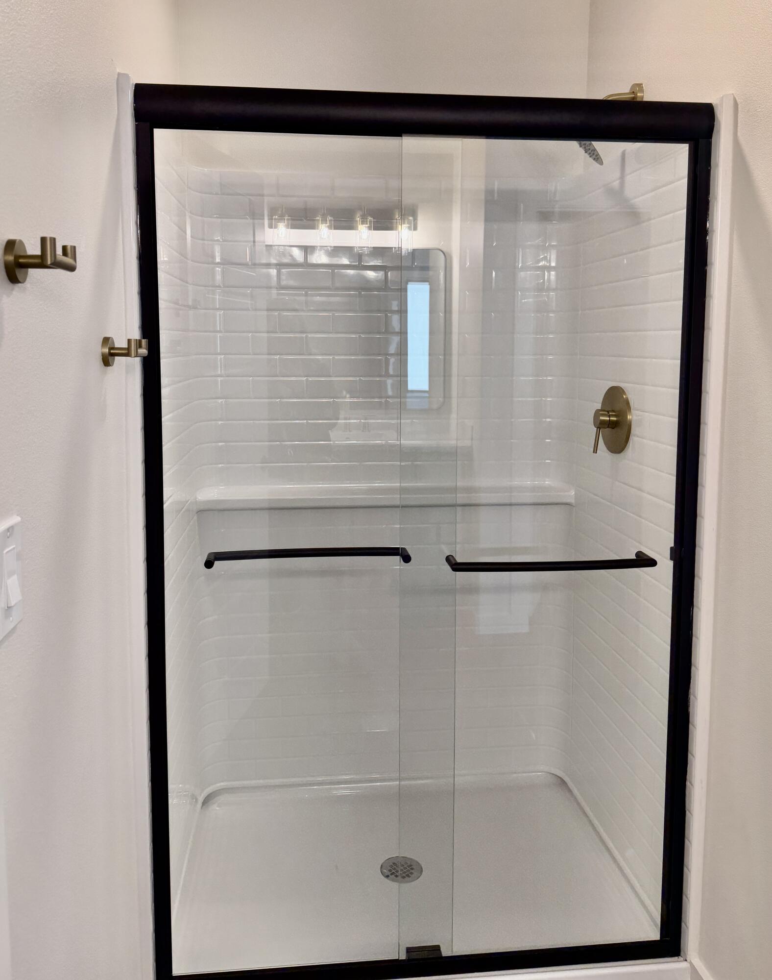 7007 16th Street Lubbock, TX 79416 - Photo 17 of 32 a close view of a refrigerator in a bathroom