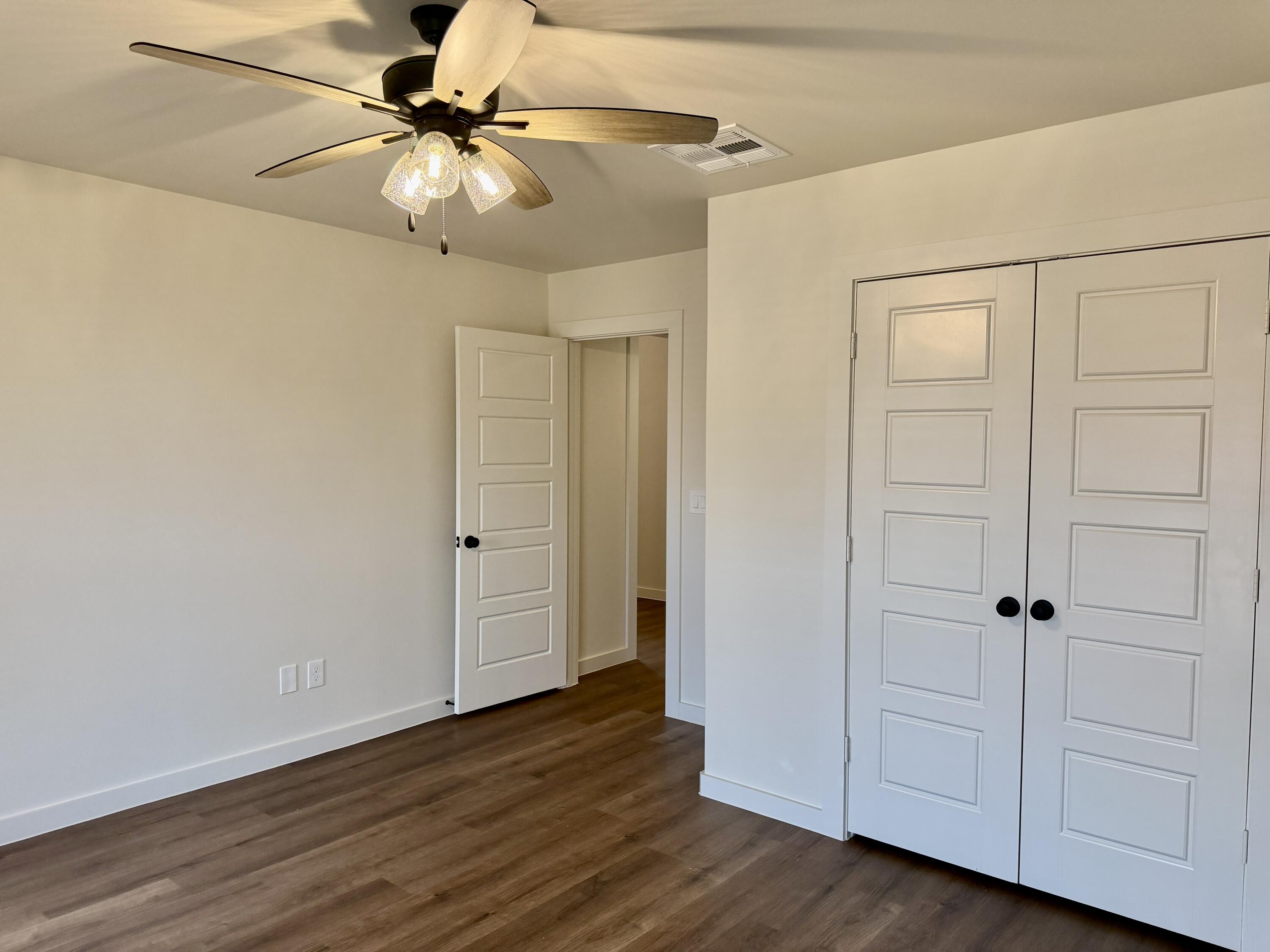 7007 16th Street Lubbock, TX 79416 - Photo 21 of 32 a view of a livingroom with wooden floor
