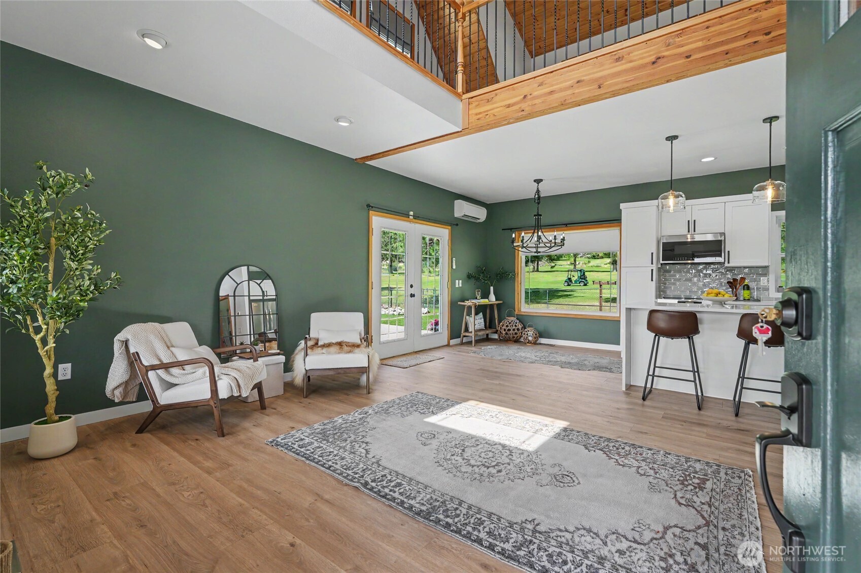 93 Golf Course Drive Pateros, WA 98846 - Photo 2 of 34 a living room with furniture and a potted plant
