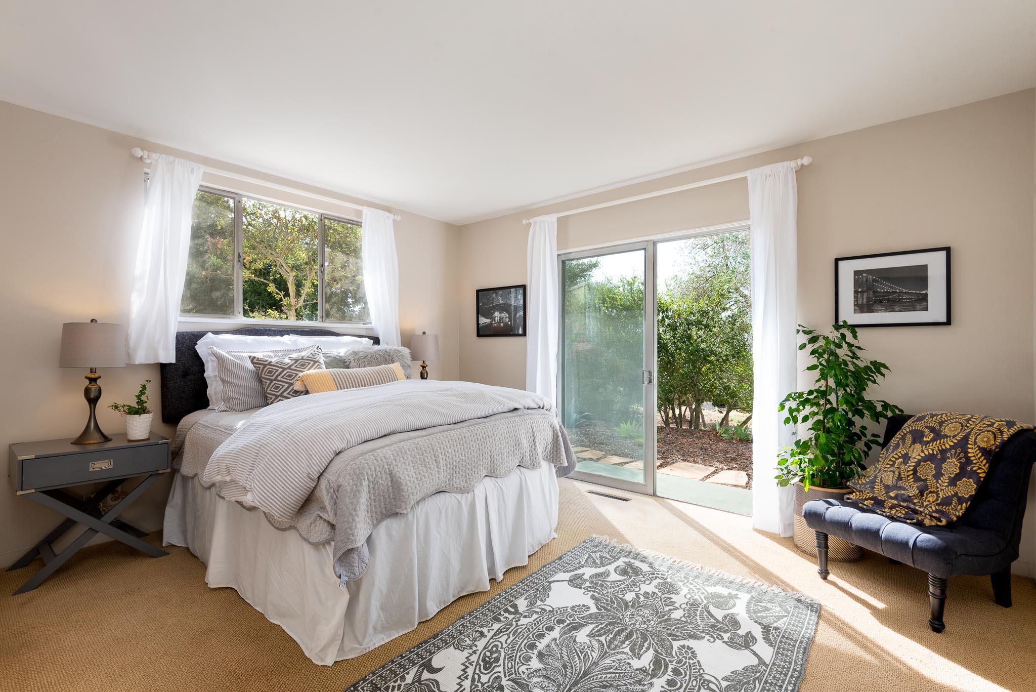 1645 Las Canoas Road Santa Barbara, CA 93105 - Photo 13 of 30 a bedroom with a bed and a couch