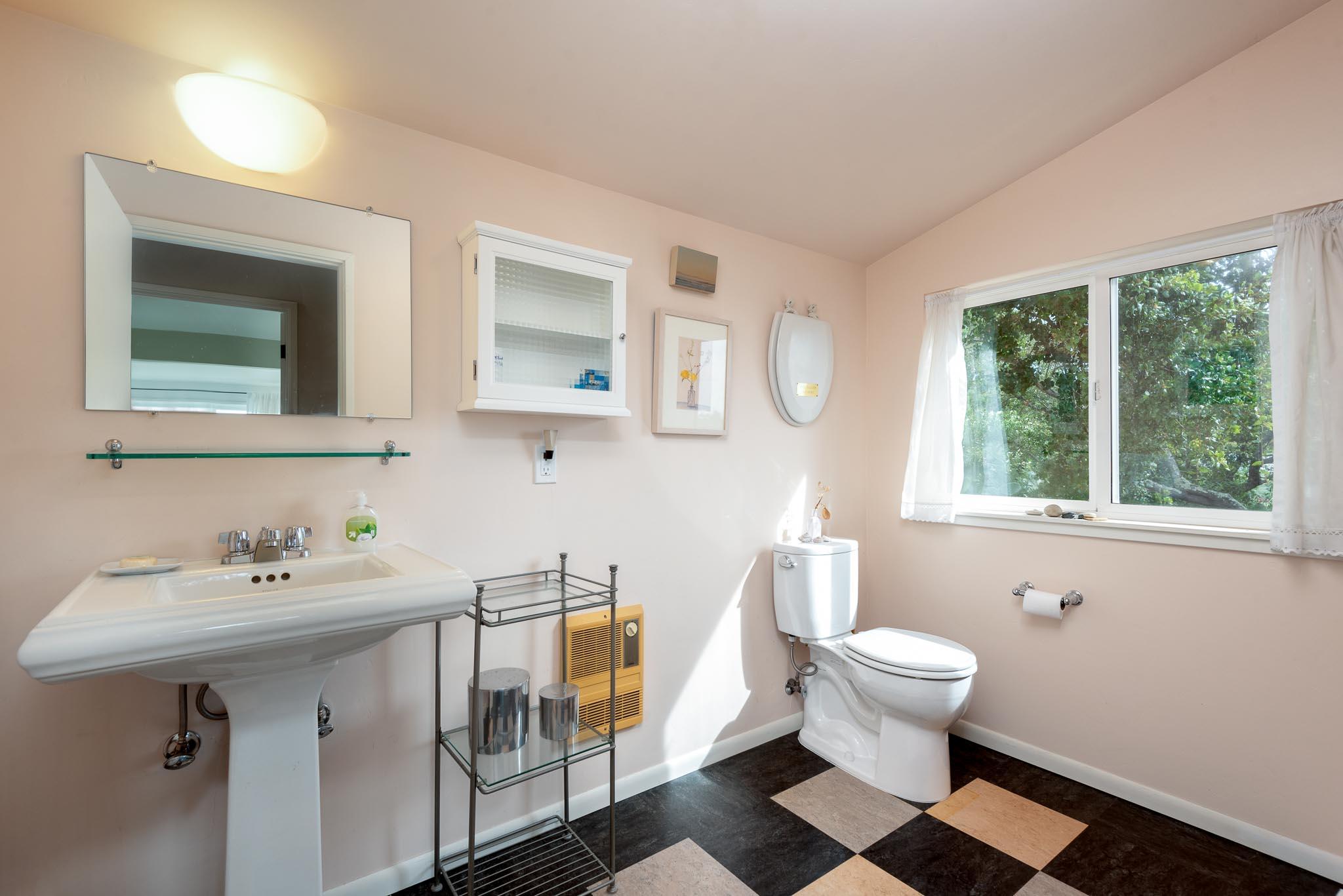 1645 Las Canoas Road Santa Barbara, CA 93105 - Photo 24 of 30 a bathroom with a sink toilet and a mirror
