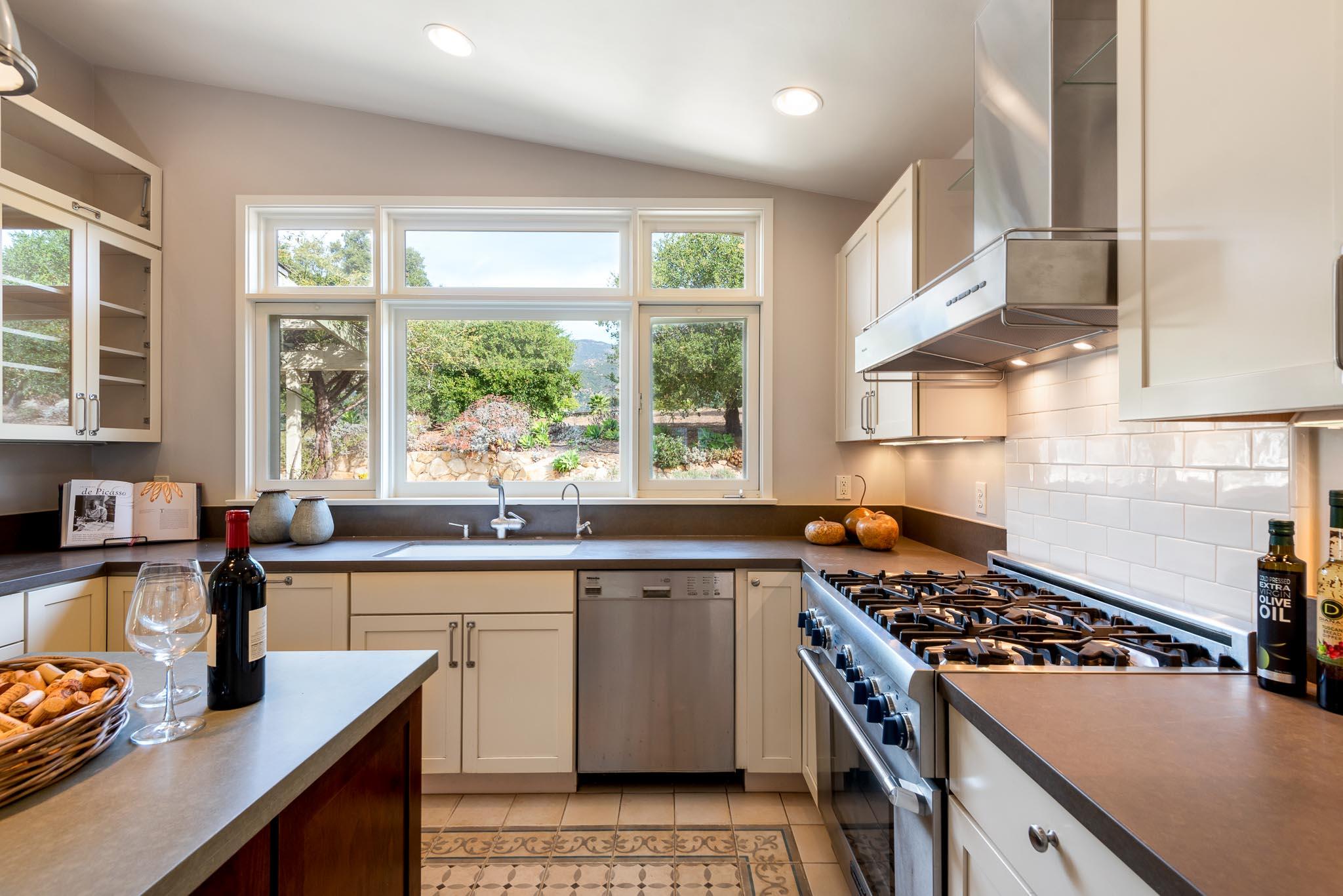 1645 Las Canoas Road Santa Barbara, CA 93105 - Photo 10 of 30 a kitchen with stainless steel appliances a stove a sink and a refrigerator