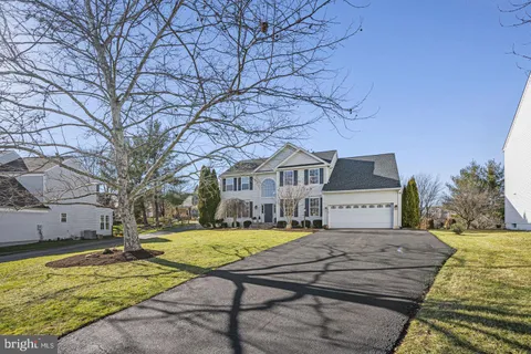 a house with trees in front of it