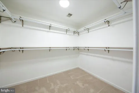 a view of a room with racks on the wall