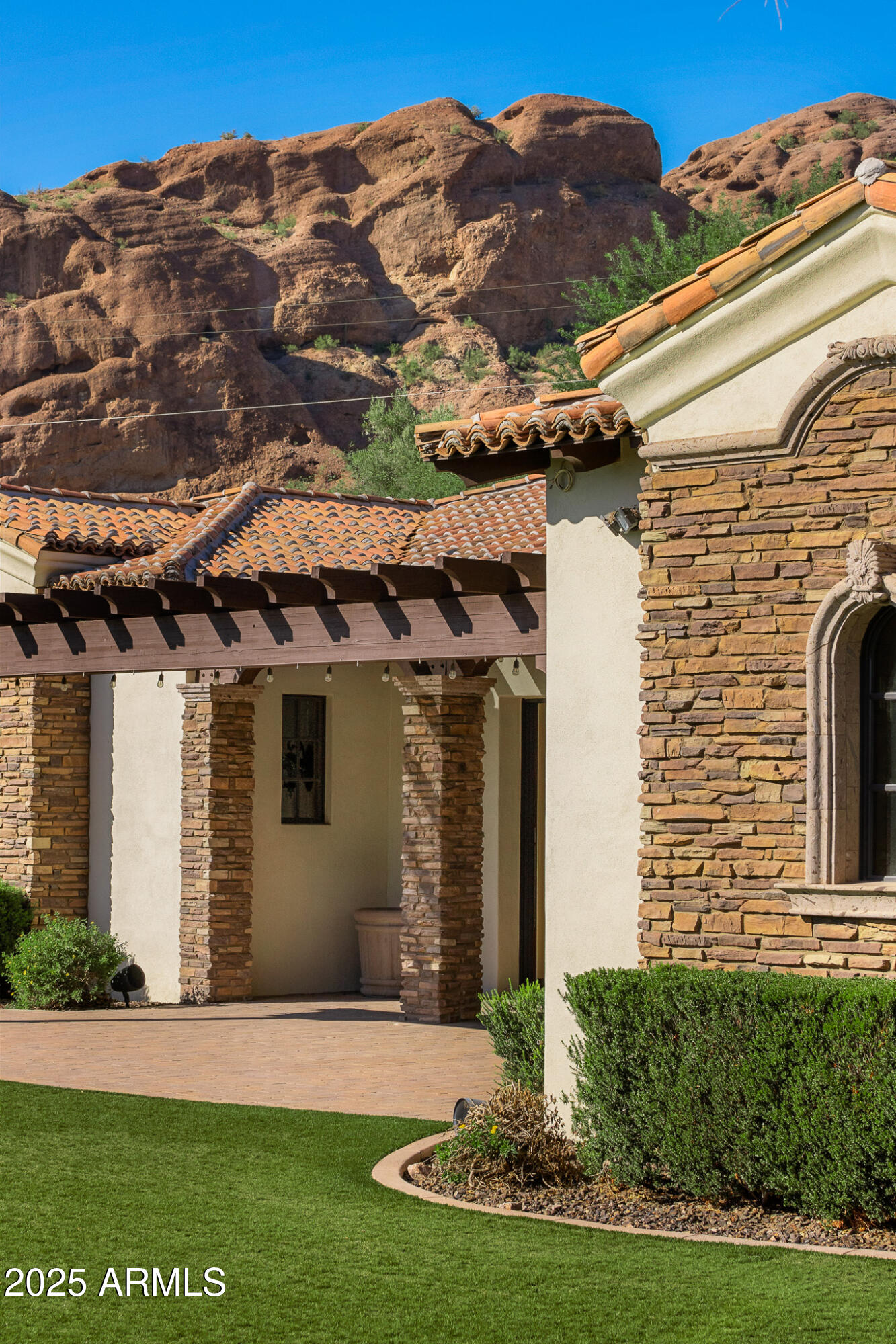 4838 East Palomino Road Phoenix, AZ 85018 - Photo 25 of 26 a view of a house with a yard
