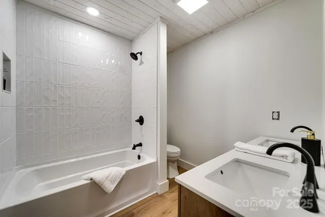 a bathroom with a sink and a bathtub