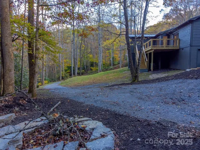 an aerial view of residential house with outdoor space