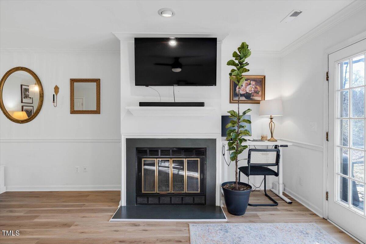 6910 Saxby Court Raleigh, NC 27613 - Photo 9 of 26 fireplace