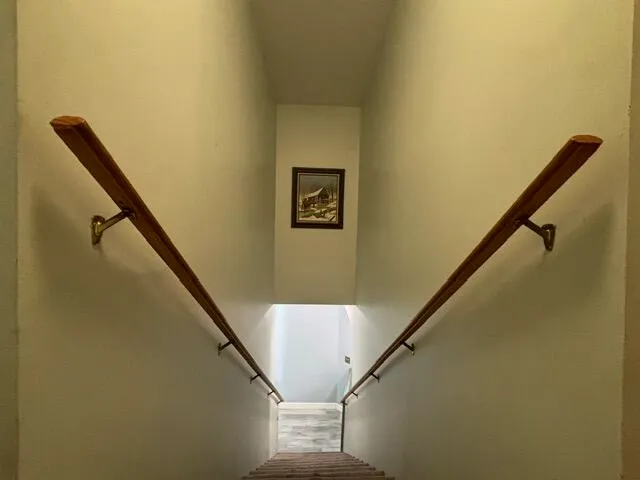 a view of a living room with clothes and shoes