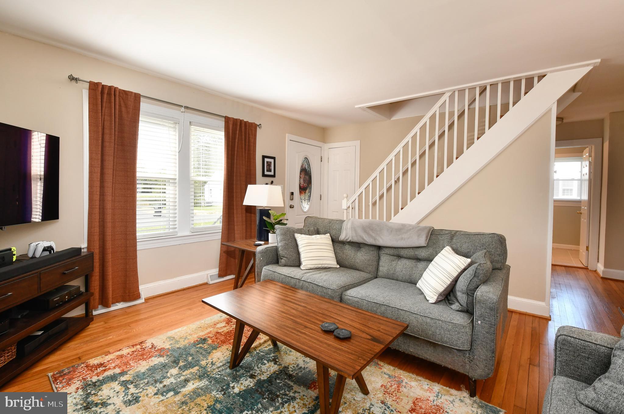 20 Randolph Road Fredericksburg, VA 22405 - Photo 11 of 36 Living room with hardwood & lots of windows