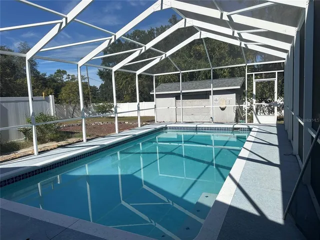 a view of a house with a large window