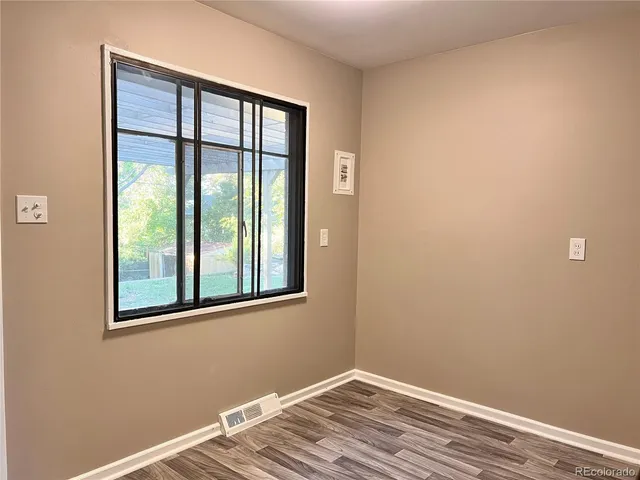 a view of a room that has a window