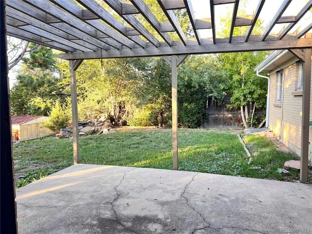 a view of backyard with green space