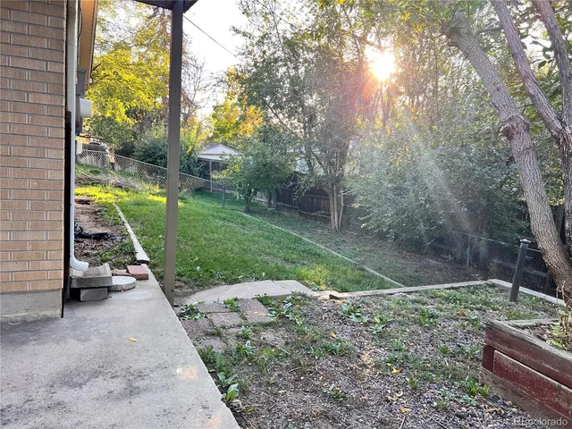 a view of backyard with green space