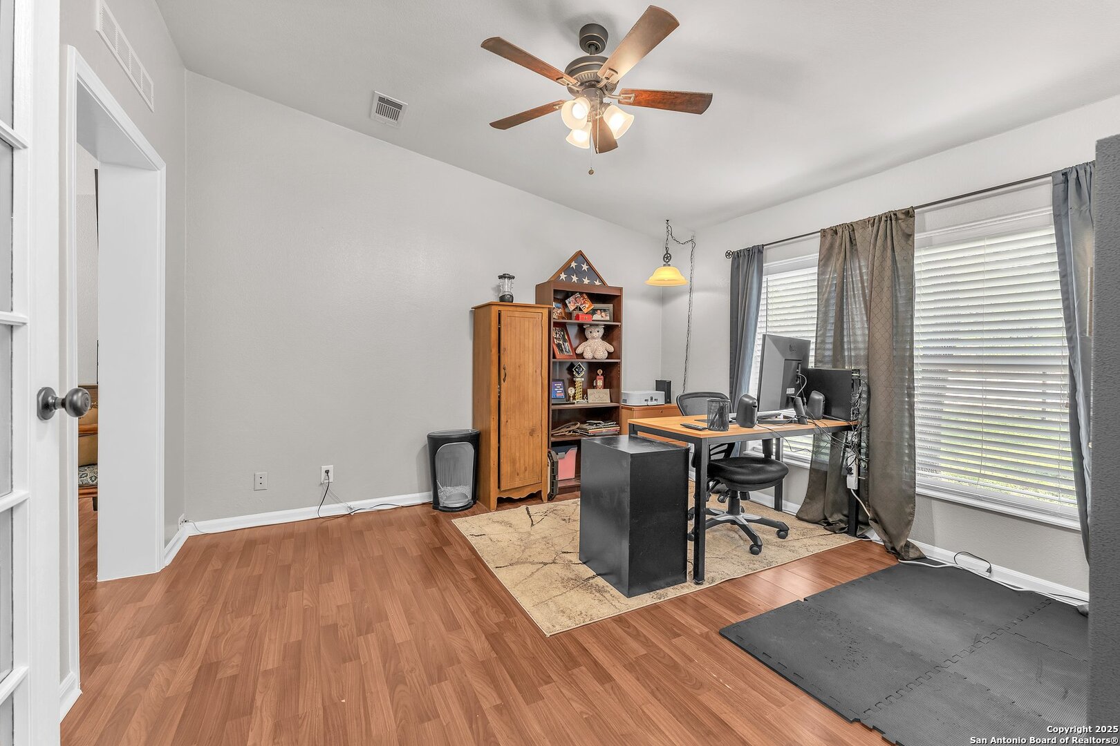 11650 Sunset Ranch Helotes, TX 78023 - Photo 120 of 141 a view of a workspace with furniture and a window