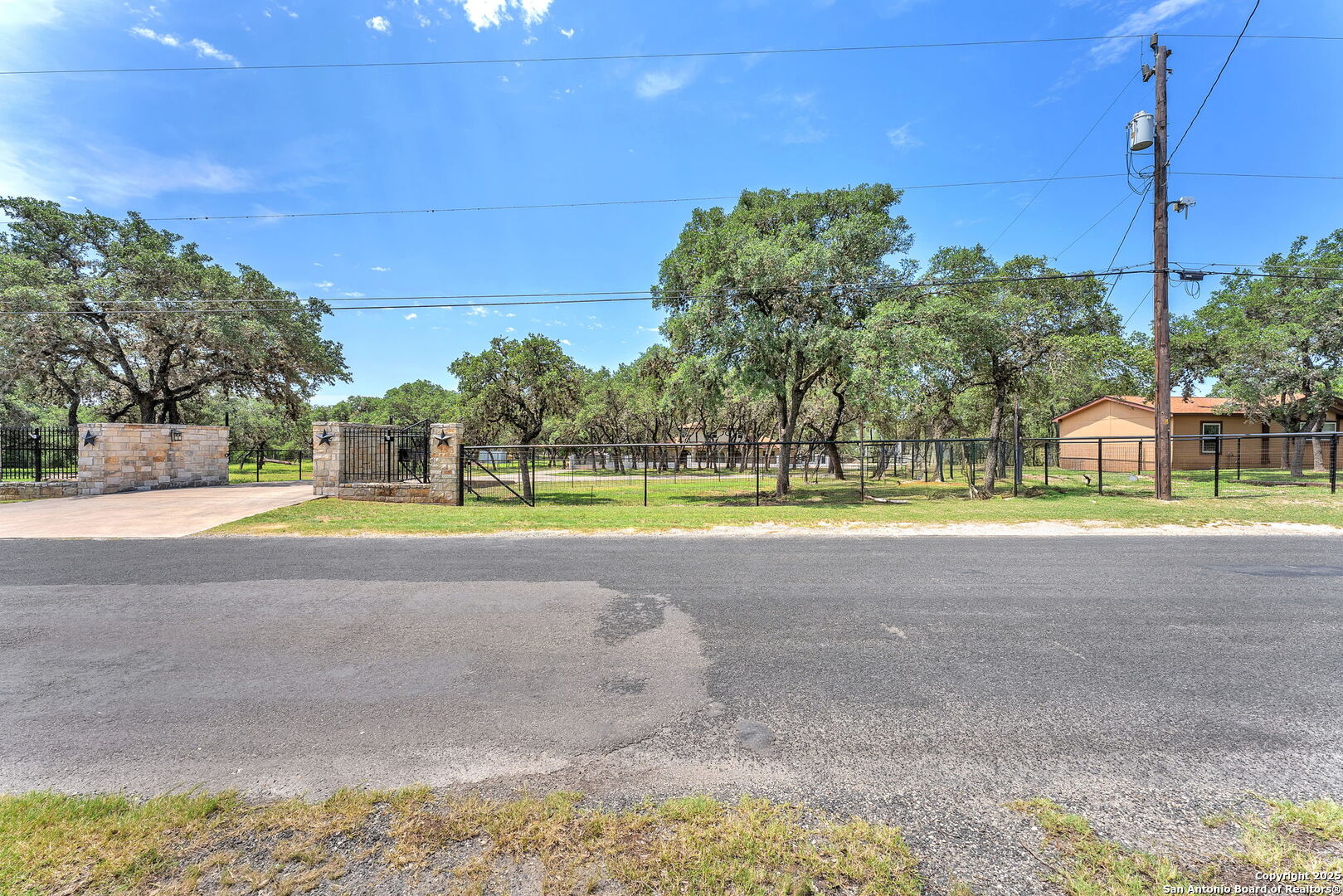 11650 Sunset Ranch Helotes, TX 78023 - Photo 139 of 141 a view of a swimming pool and a yard
