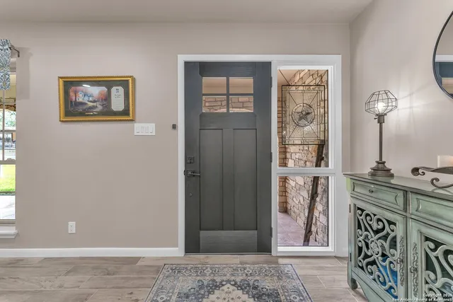 a bathroom with a shower and a sink